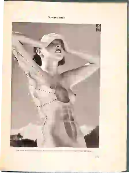 A young beautiful naked woman, with hands on her forehead, absorbs the rays of the sun (indicated by dotted lines)