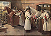 Four men in white smocks extract blood from two horses in a stable.