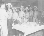 Public Health Service officer vaccinating Mexican migrant workers in El Paso, Texas.