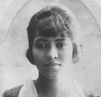 Dr. Ruth Marguerite Easterling, an oval shaped portrait of an African American female posing directly straight.