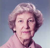 Dr. Georgeanna Seegar Jones, a White female in formal attire posing for her portrait. 