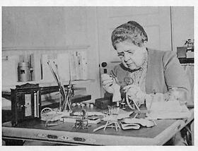 Mrs. Frances Glessner Lee at work on the Nutshell Collection, 1940s-1950s