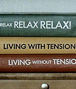 A stack of book titles about relaxation and tension.